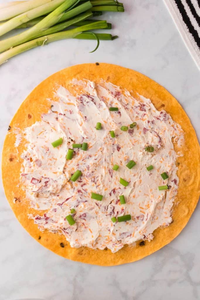 Tomato tortilla with cream cheese spread