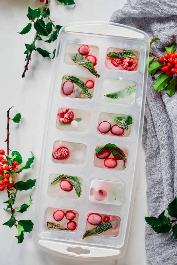 Holiday Fruit Ice Cubes in a white tray.