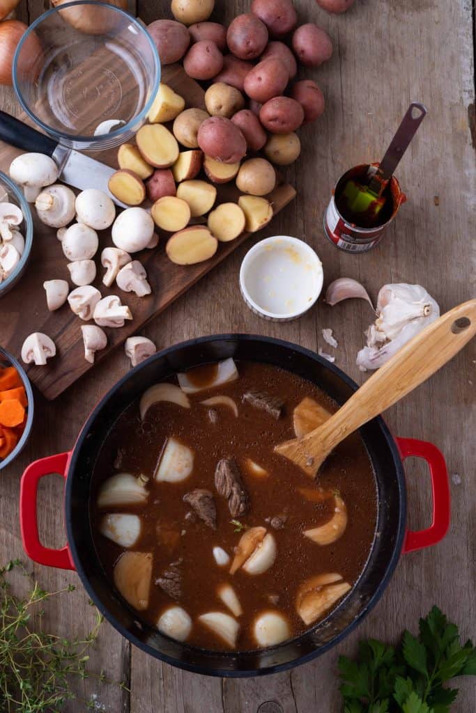 Beef stew getting ready for the oven.