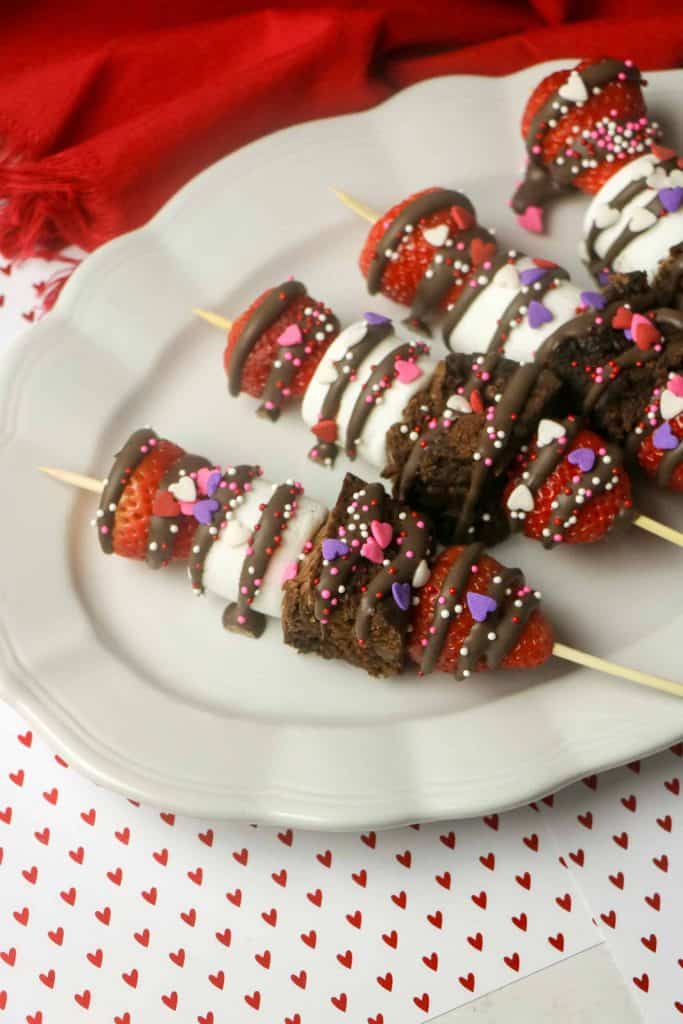 Valentine's Day Dessert Kabobs on a white platter.
