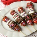 Chocolate Strawberry Dessert Sticks on a white platter.