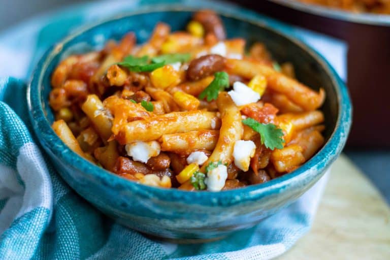 Vegan Chili Mac in a blue enamel bowl.
