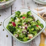 Broccoli Apple Salad in white square serving bowl.