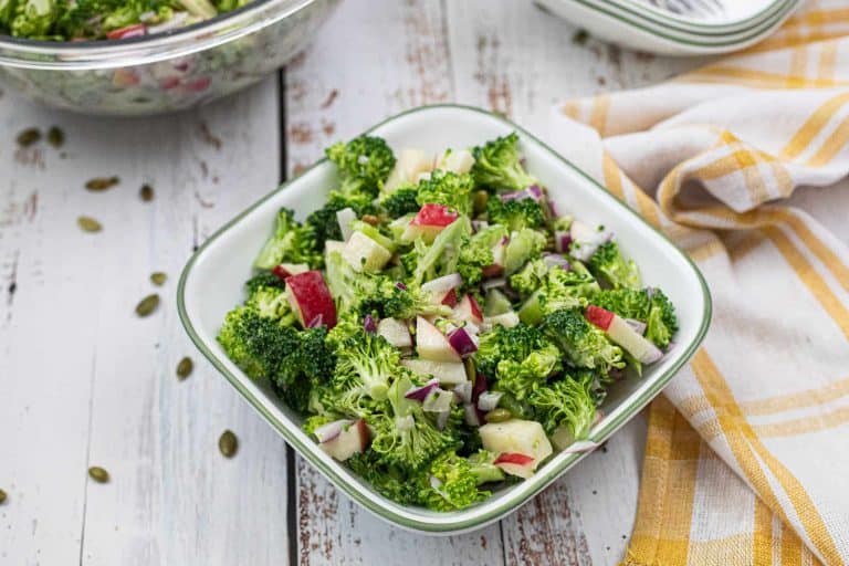 Broccoli Apple Salad in white square serving bowl.
