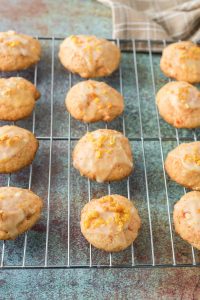 Carrot Cookies with Orange Glaze on a wire cooling rack.