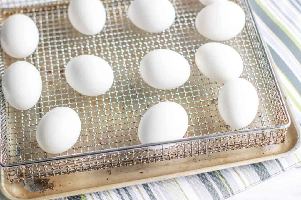Eggs in air fryer basket.