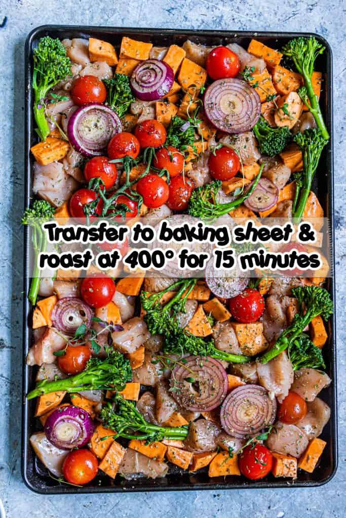 Cherry tomatoes, red onion, chicken breast, sweet potatoes and broccoli with honey balsamic marinade on sheet pan.