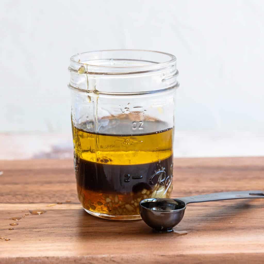 Sesame dressing in a Mason jar.