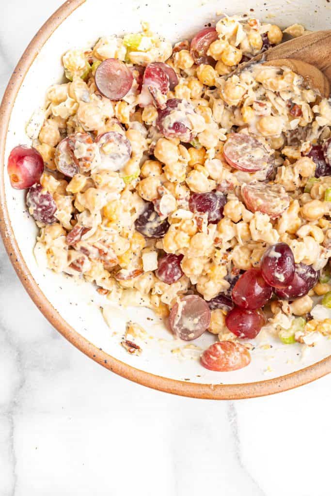 Vegan chicken chickpeas salad with grapes in a ceramic bowl.