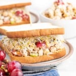 Head on view of Sonoma Chickpea Salad Sandwich with a second sandwich behind the first one.