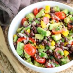 White bowl with guacamole salad.