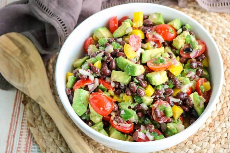 White bowl with guacamole salad.