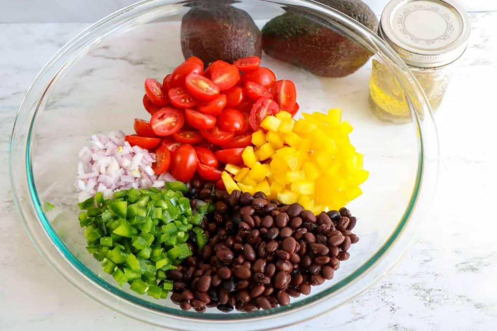 Bell pepper, black beans, cherry tomatoes and diced red onion.
