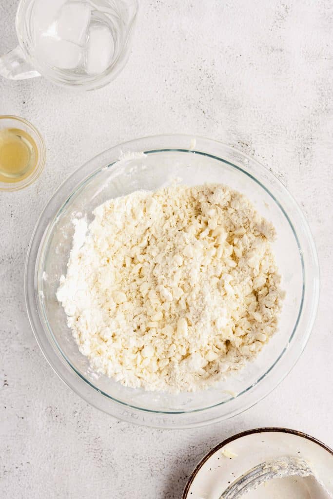 Coarse flour mixture in a glass bowl.