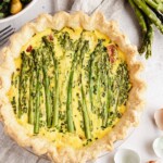 Overhead view of spring vegetable quiche.