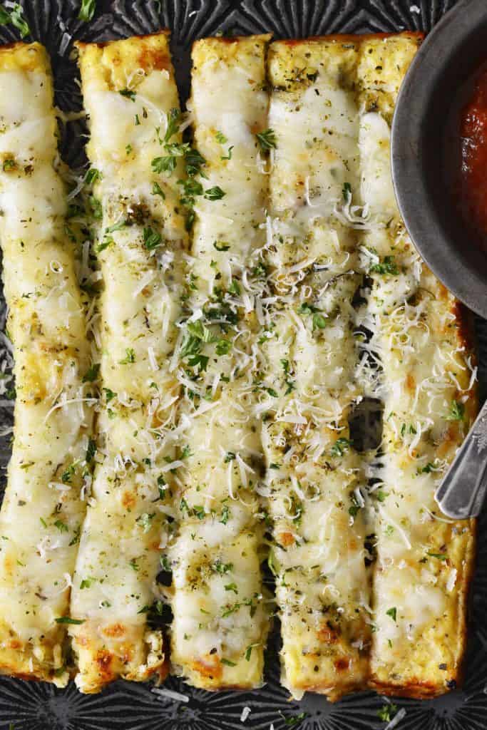 Overhead shot of Cheesy Keto Breadsticks hot out of the oven.