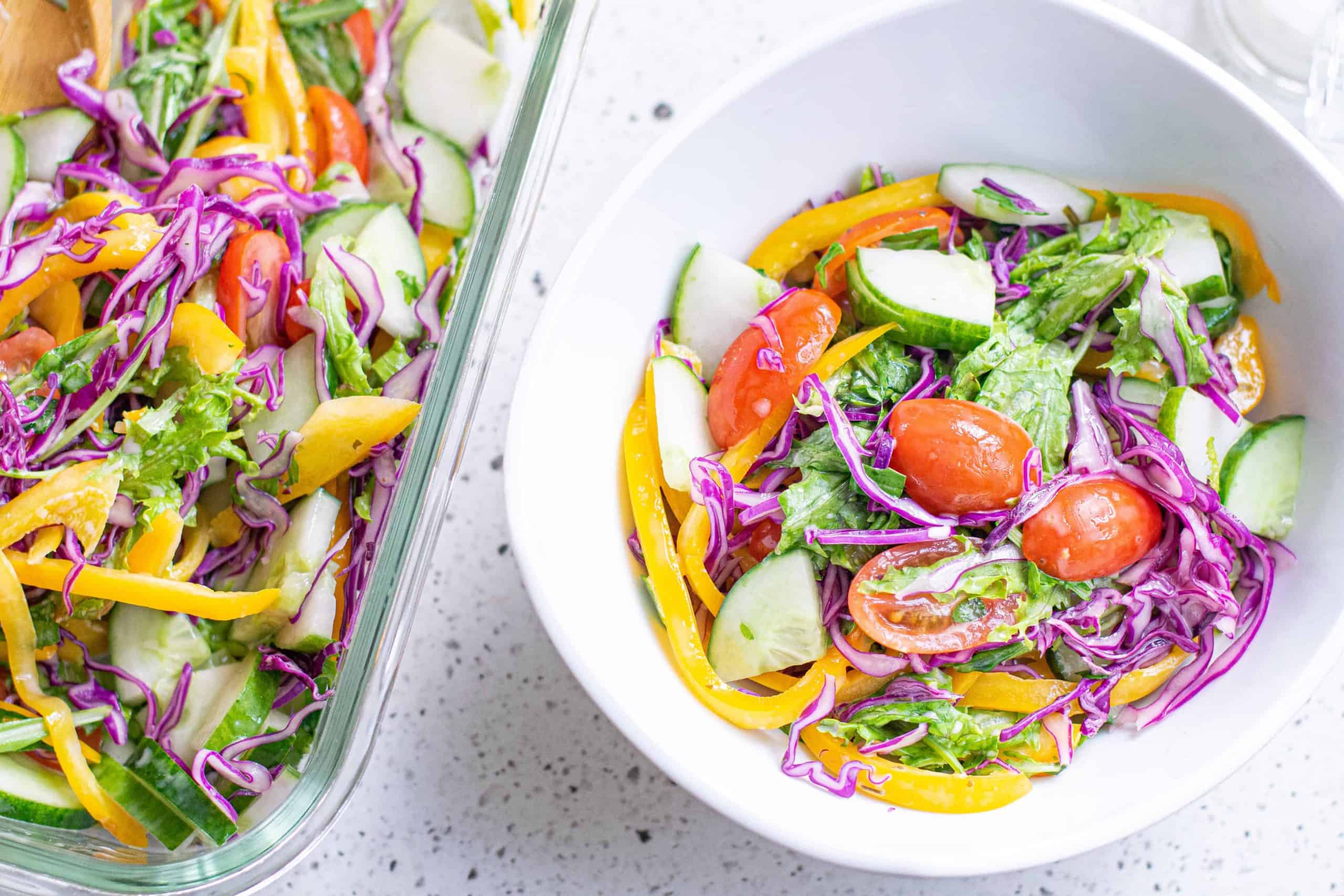 White bowl with rainbow salad