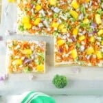 Veggie bars with a slice removed.