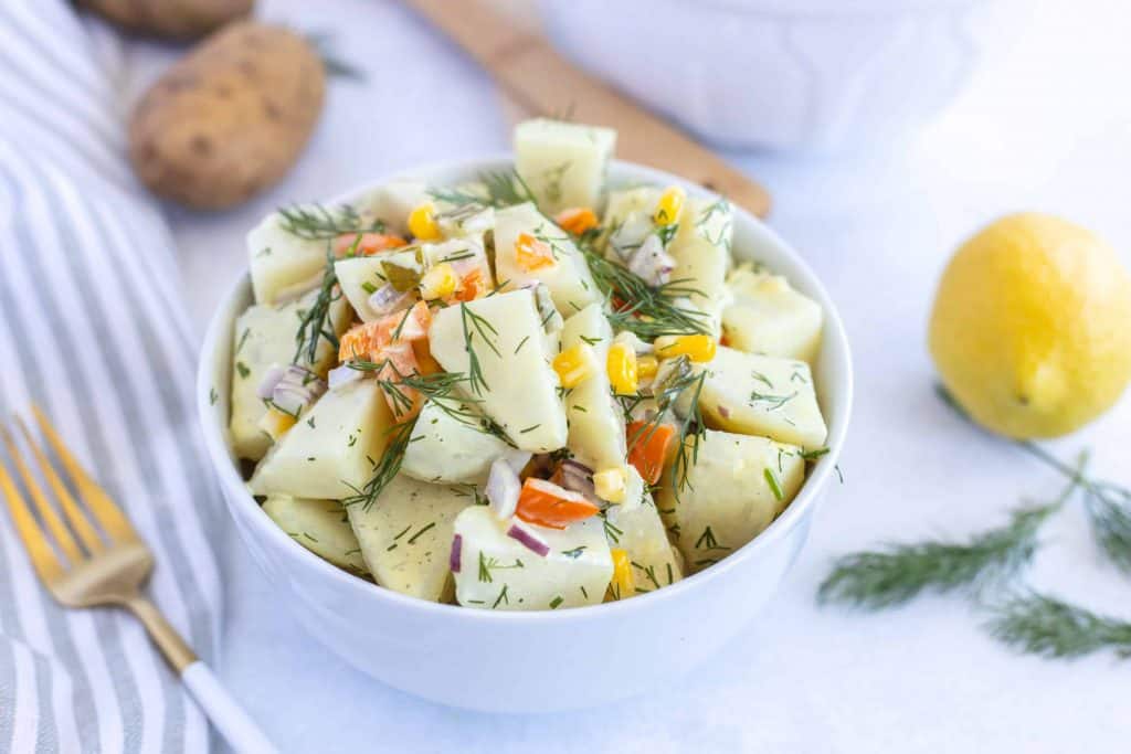 Corn and potatoes in a pot.