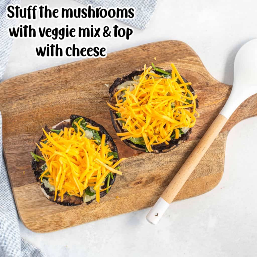 Stuffed mushrooms on a cutting board.