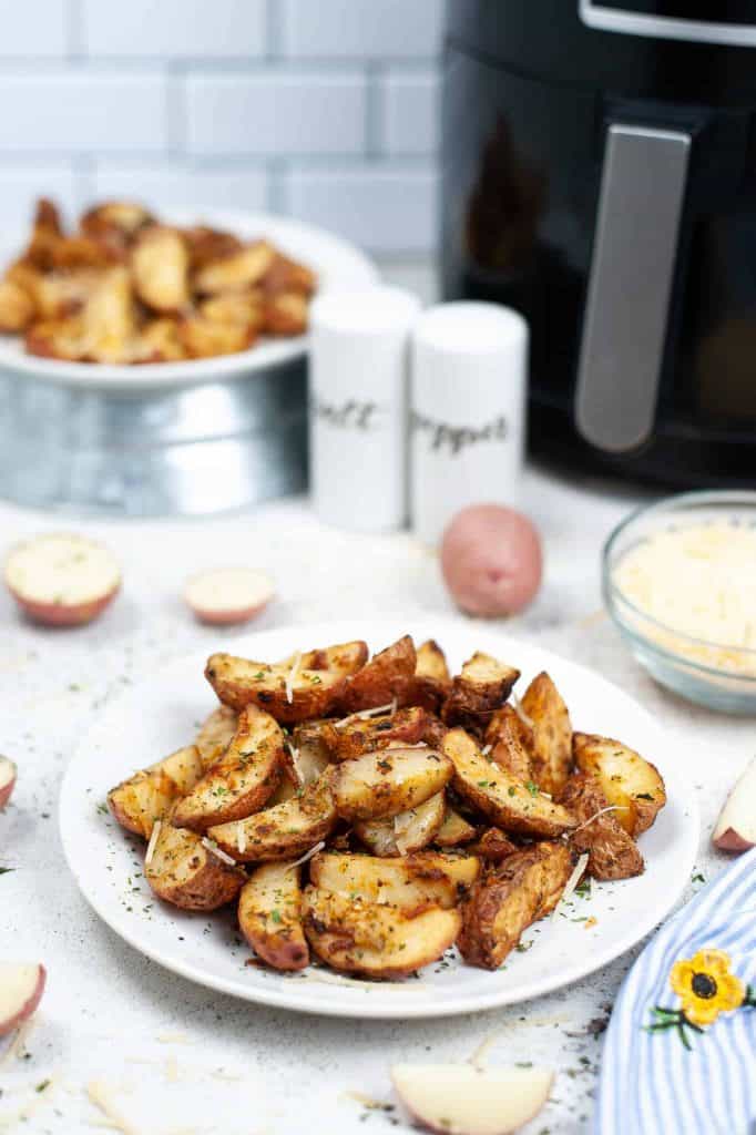 Air fryer potatoes on a white plate.