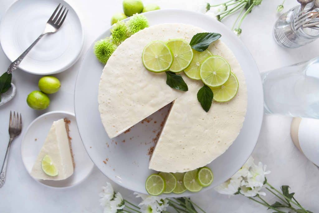 Overhead photo of lime pie with slice removed.