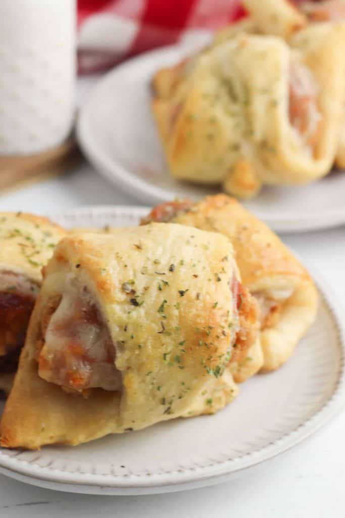 closeup of crescent roll chicken Parm sliders.