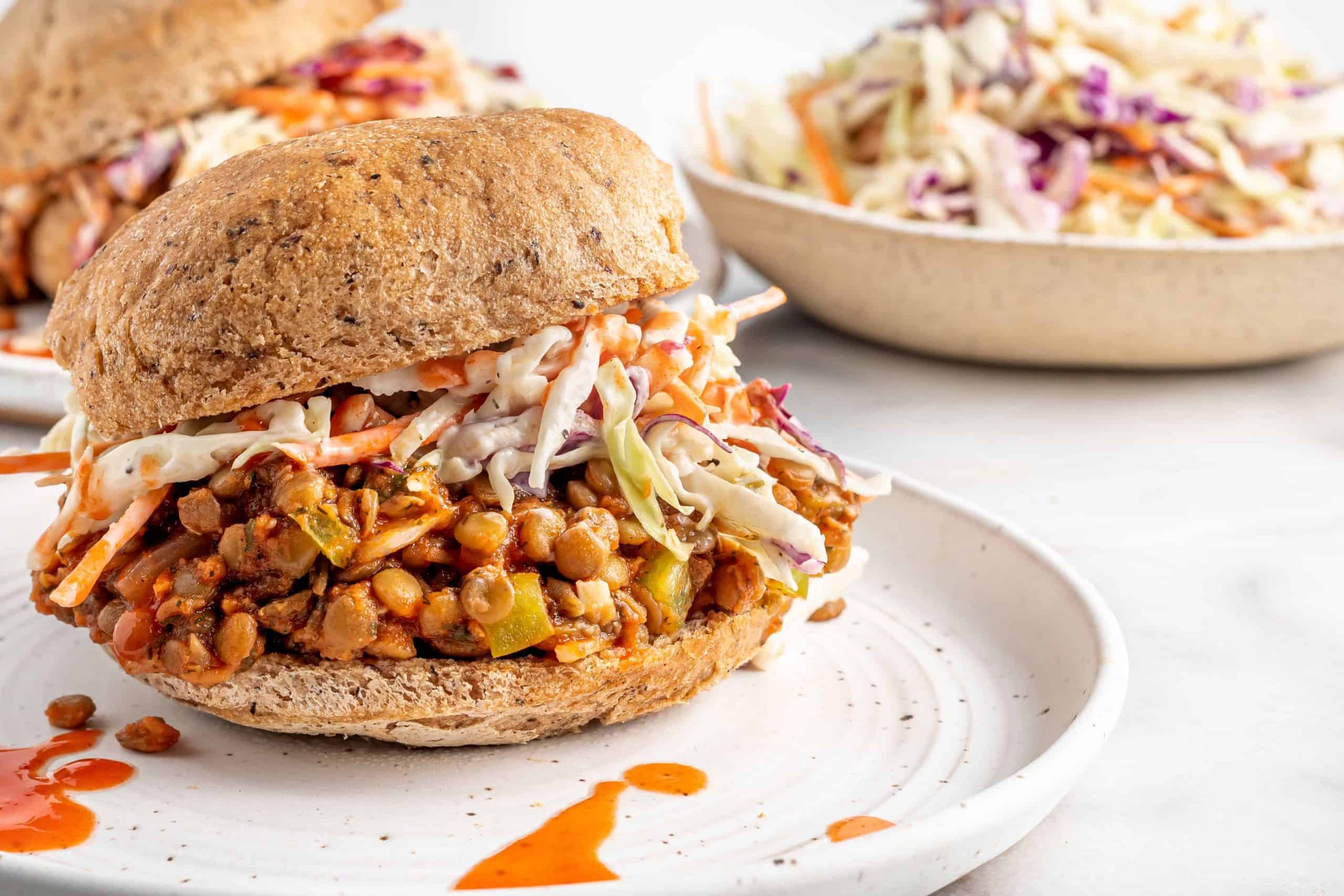 Head on view of vegan Buffalo Sloppy Joe sandwich.