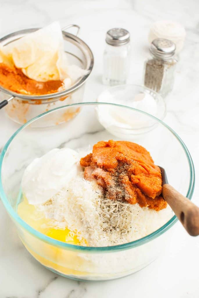 Pumpkin and ricotta cheese in a bowl.