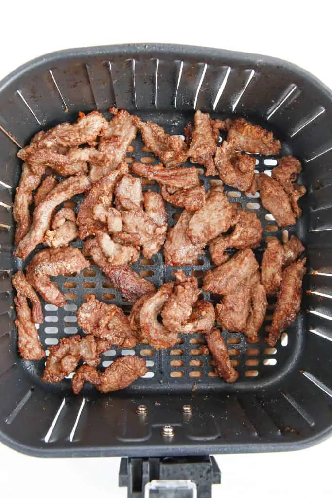 Air Frying flour coated Flank Steak.