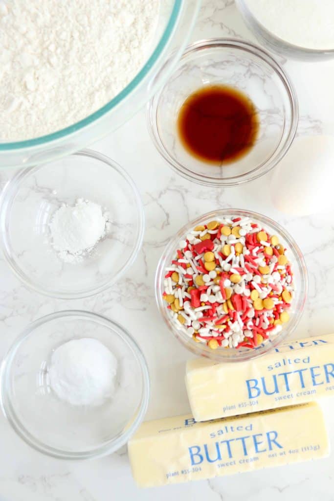 Ingredients for sugar cookies with sprinkles.
