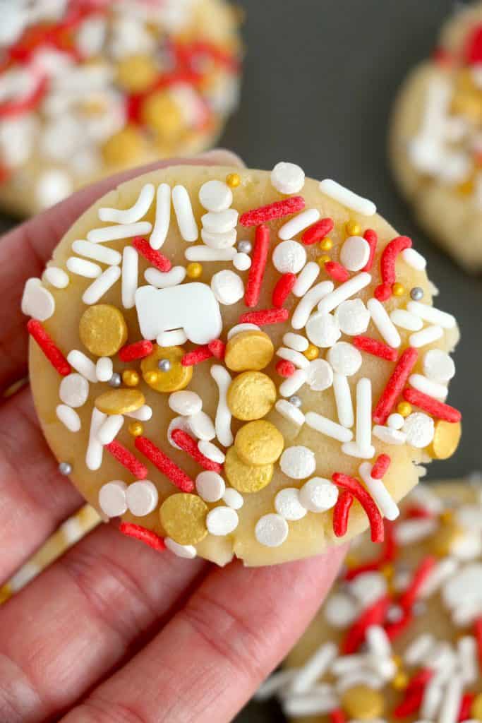 Cookie dough with sprinkles on top.