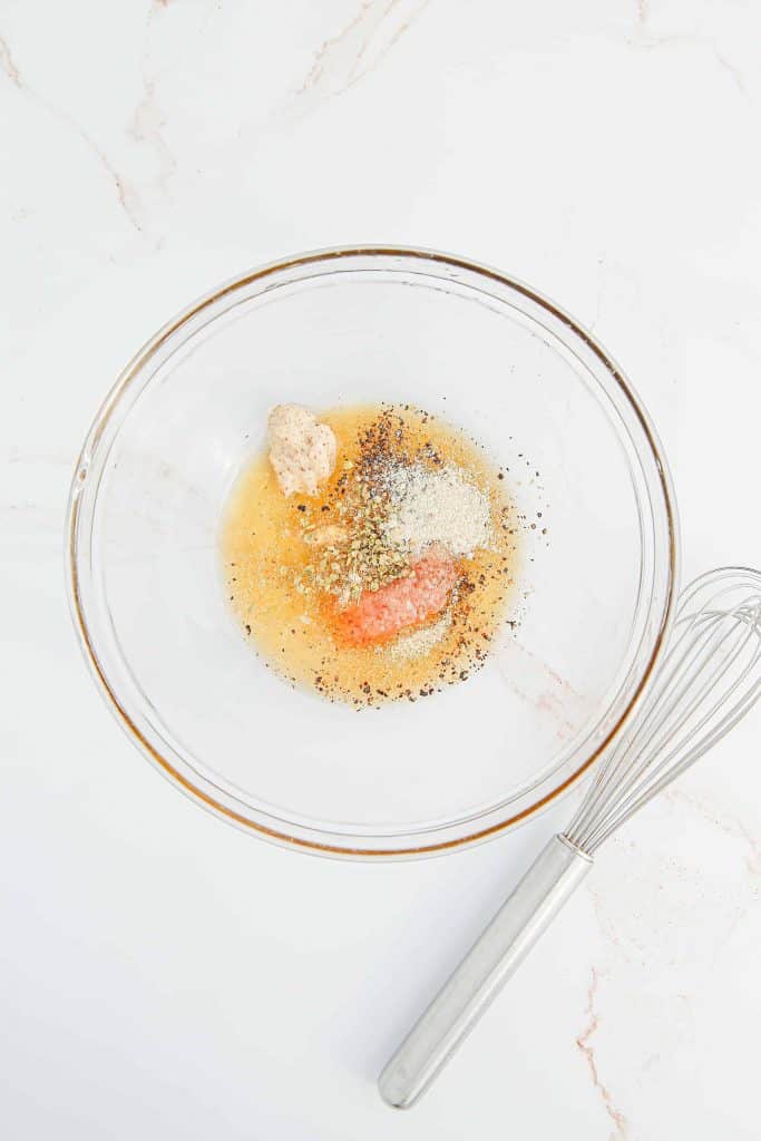 Ingredients for maple glaze in a glass bowl.