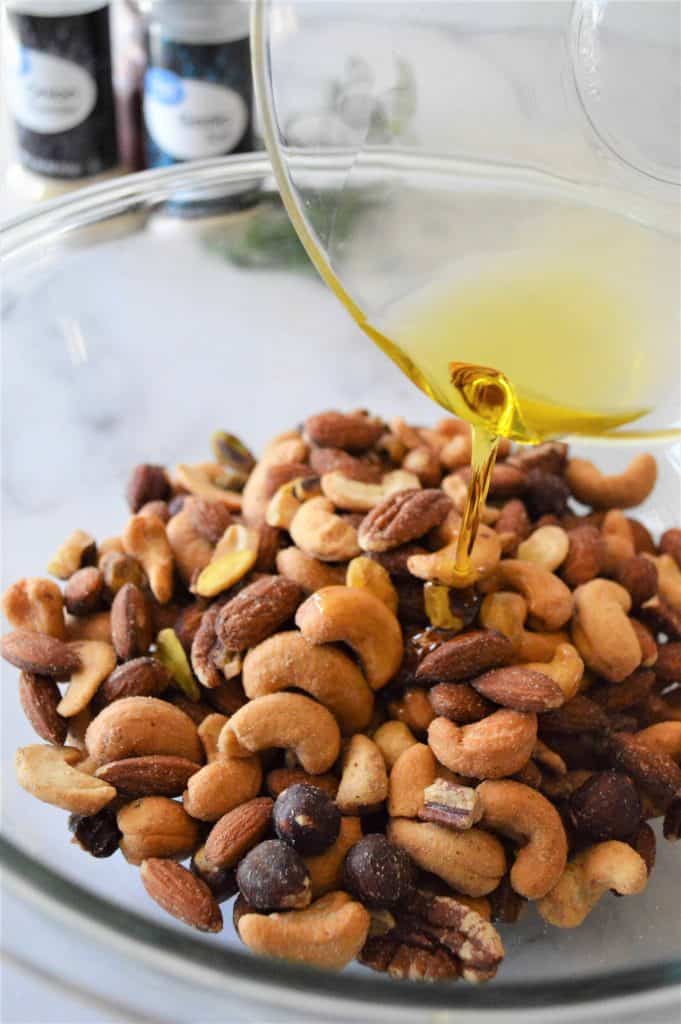 Oil poured back onto mixed nuts.