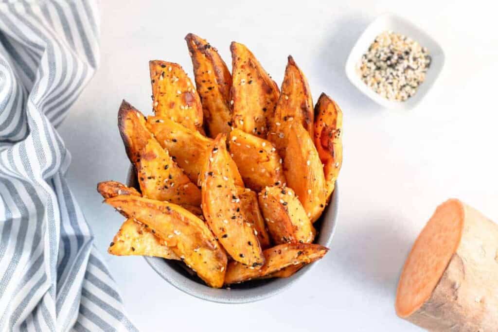 Overhead view of sweet potato wedges.