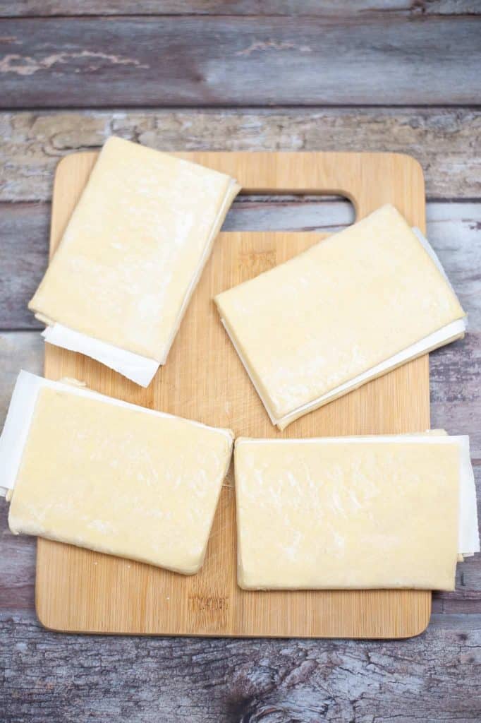 Puff pastry on a cutting board.