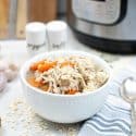 Instant Pot Chicken Barley Soup in a white bowl.