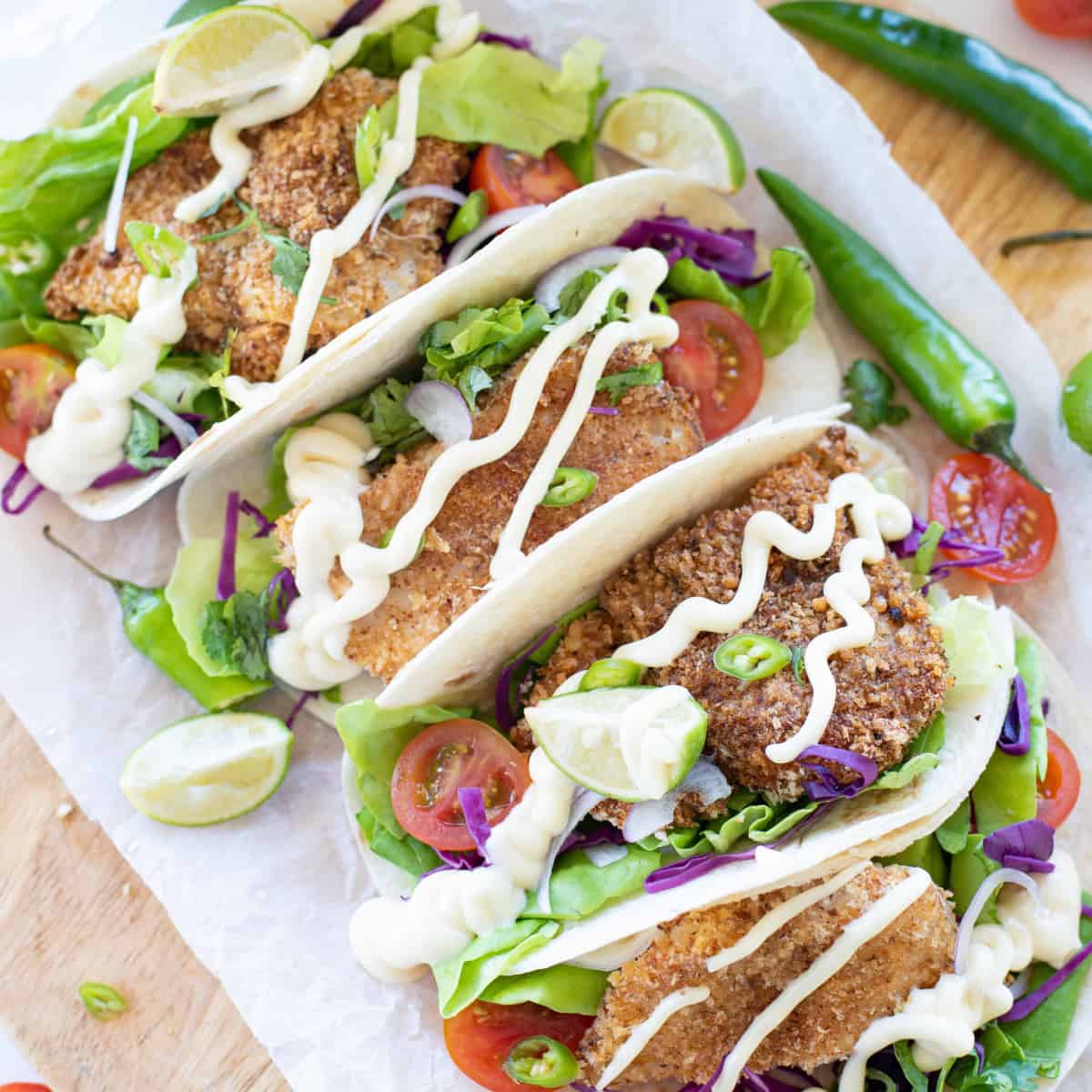 Overhead view of air fryer tacos.