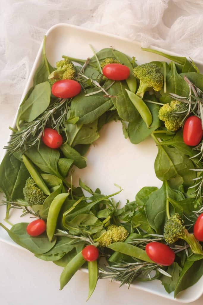 Overhead view of spinach salad wreath.