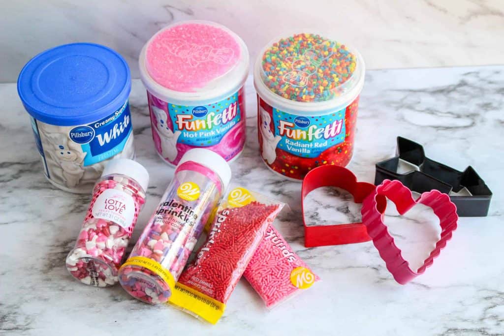 Cookie cutters, icing, sprinkles