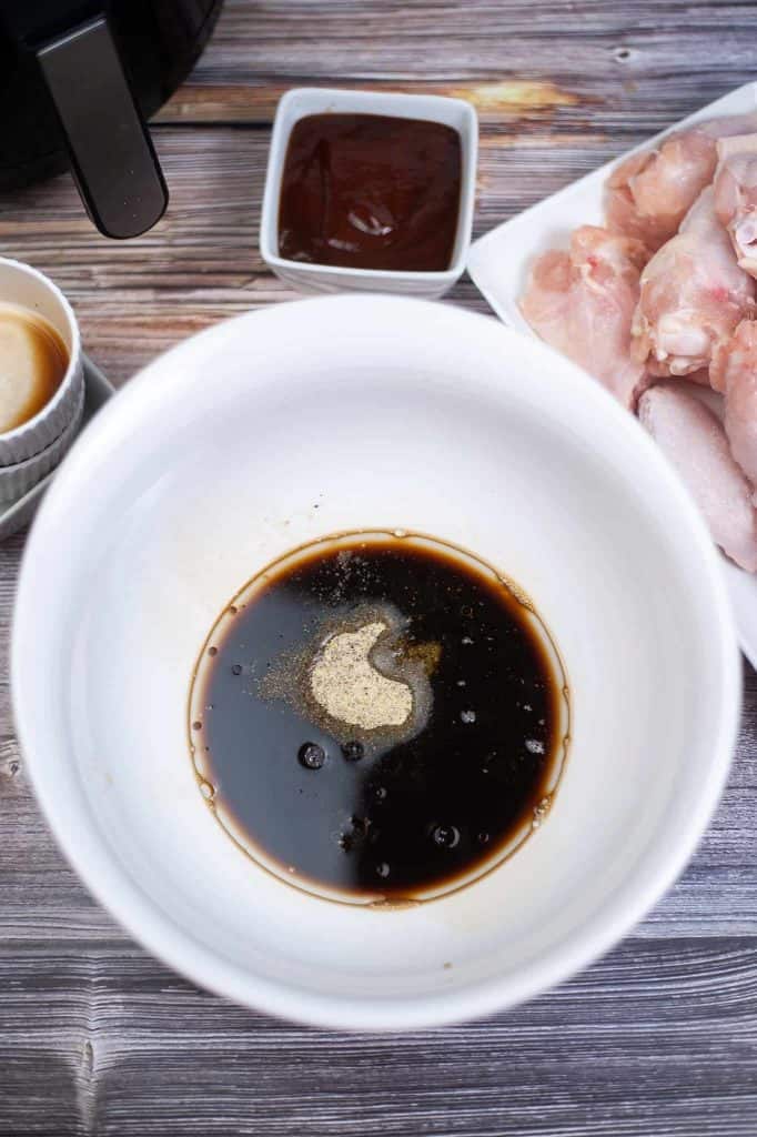 Marinade sauce in a white bowl.