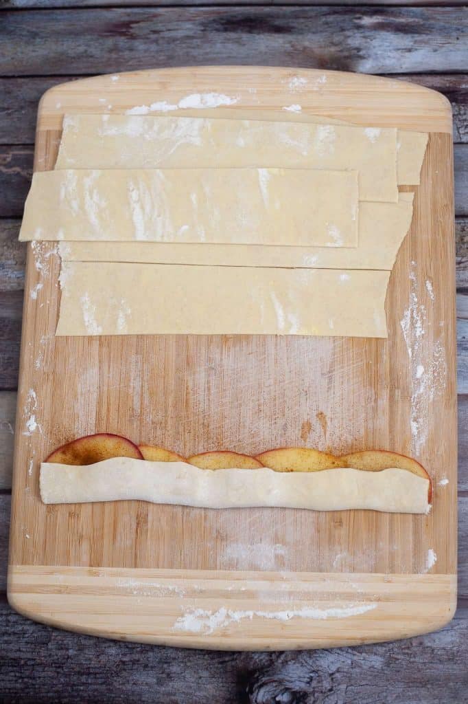 Puff pastry folded over apple slices.