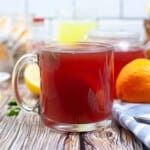 Medicine Ball Tea with lemon wedges in it.