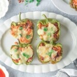 Overhead view of stuffed bell peppers.