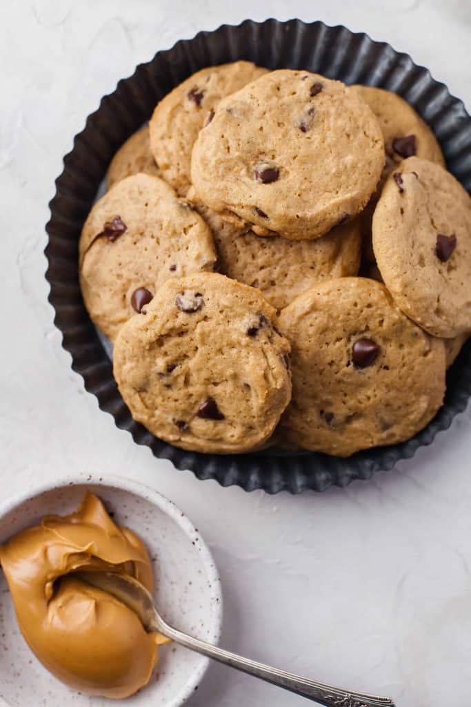 Peanut butter chocolate chip cookies on a plate.