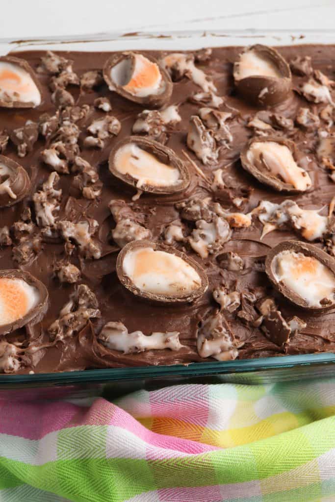 Chocolate poke cake with Cadbury Creme Eggs