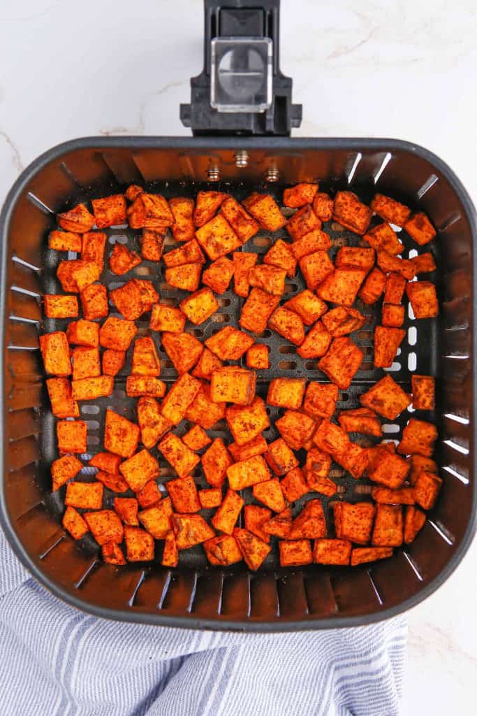 Cooked Sweet Potatoes in Air Fryer Basket