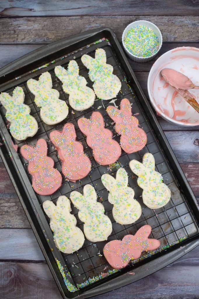 Easter bunny cookies on a wire baking rack.