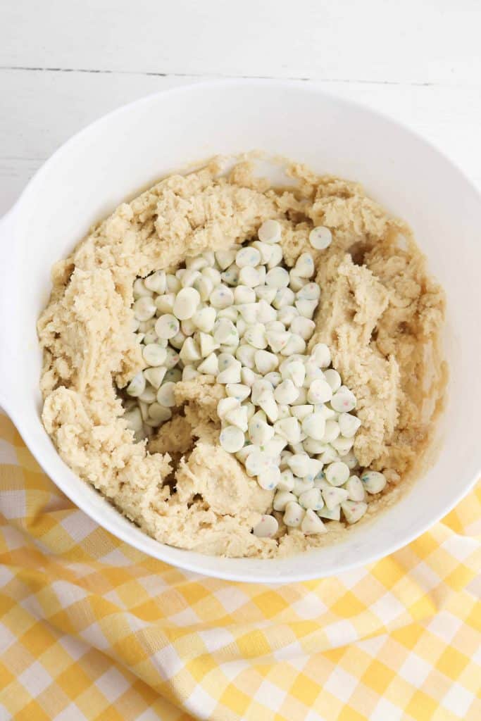 Funfetti chips on top of cookie dough.