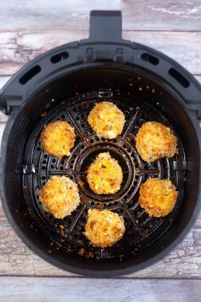 Jalape&ntilde;o peppers bites in air fryer basket